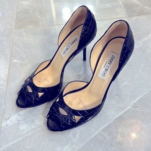 Jimmy Choo Sz 37. Bottoms worn otherwise look great.